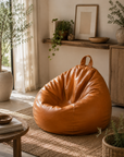 Pouf de salon effet cuir cognac