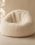 Pouf de salon bouclé écru — Confort personnalisé