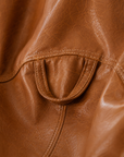 Pouf de salon effet cuir cognac