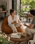 Pouf de salon effet cuir cognac