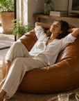 Pouf de salon effet cuir cognac