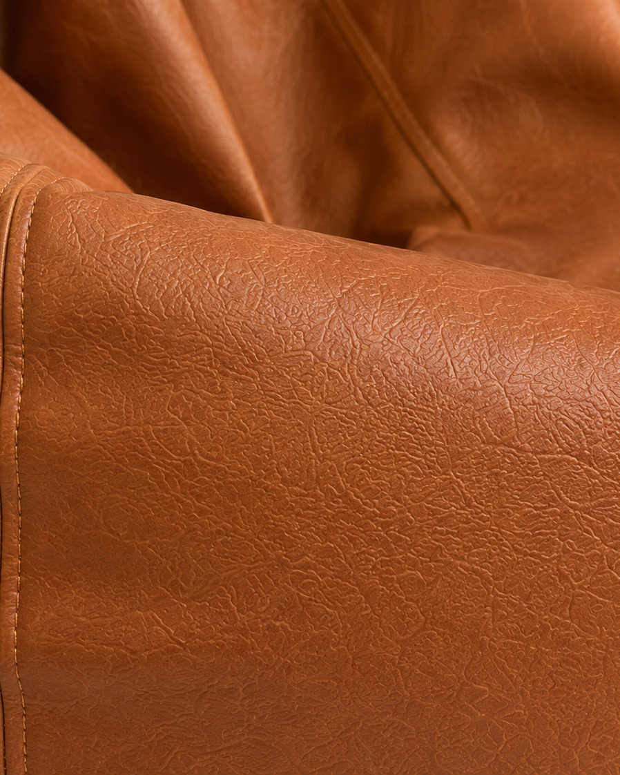 Pouf de salon effet cuir cognac